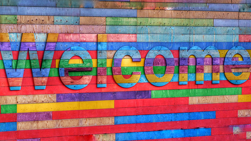 welcome sign on a wall