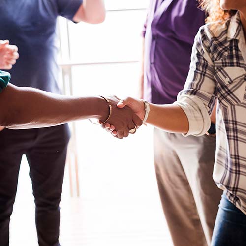 two people shaking hands